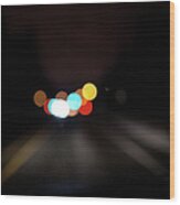 Driving At Night With Colourful Lights Wood Print
