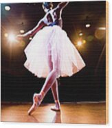 Female Ballerina On Stage Dancing Wood Print