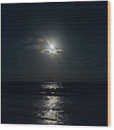 Full Moon Through Clouds Over The Ocean Wood Print