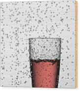 Glass Of Juice In Water Drops Wood Print