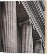 Gray Ionic Columns At The Front Of A Wood Print