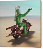 Green Spaceman Riding Motorcycle With Gun Wood Print