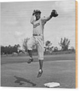 Jackie Robinson Making Toss In Midair Wood Print