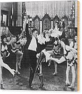 John Gilbert Dances With Girls In Movie Wood Print