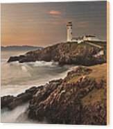 Lighthouse On Foggy Coastline Wood Print