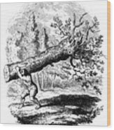 Man Carrying A Large Tree Trunk Wood Print
