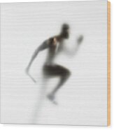 Man Running Relay Race, Carrying Baton Wood Print