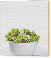 Mixed Salad In A Bowl, White Background Wood Print