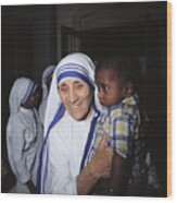 Mother Teresa Holding Young Boy Wood Print