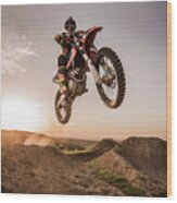 Motocross Rider Performing High Jump Wood Print