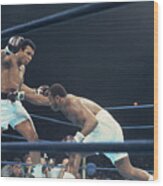 Muhammad Ali Boxing Against Joe Frasier Wood Print