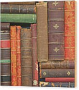 Old Books Stacked Oddly On A Shelf Wood Print