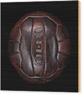 Old Leather Football On Black Wood Print