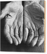 Open Hands Of An Older Person Resting Wood Print