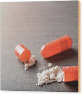 Open Orange Capsule With White Powder Drug Wood Print