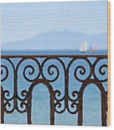 Ornate Ironwork Railing With Ocean View Wood Print