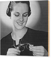 Portrait Of Woman Cleaning Eyeglasses Wood Print
