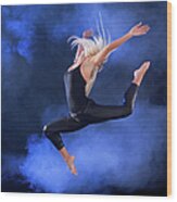 Professional Ballerina Jumping Through Wood Print