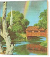 Rainbow Shining Down To A Church And Covered Bridge Wood Print