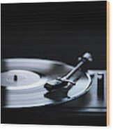 Retro Gramophone Vinyl Player Over Black Background With Copyspa Wood Print
