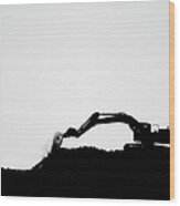 Silhouette Of A Bulldozer Digging In Wood Print