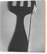 Steel Fork And Its Shadow On Plate Wood Print