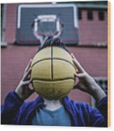 Teenager Holding Ball Wood Print