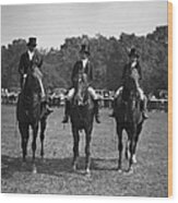Three Equestrians Ride Horses At A Show Wood Print
