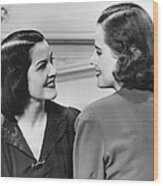 Two Women Conversing In Living Room, B&w Wood Print