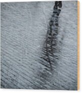 Walking Shadow Of An Unrecognised Person Walking On Wet Streets Wood Print