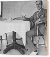 Walt Disney Sitting At Table Wood Print