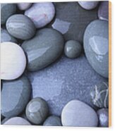 Wet Granite Pebbles On Beach Wood Print