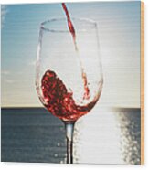 Wine Pouring Into Glass Outdoors Wood Print