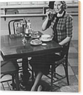 Woman In Fancy Hat Eating Breakfast In Wood Print