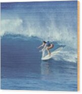 Women's World Surfing Champion Riding A Wave Wood Print