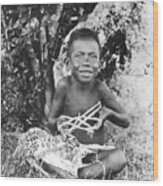Young New Guinea Boy Playing With String Wood Print