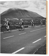 Cyclists On The Lz-30 Road Through The Wine Making Region Of La Geria Yaiza Lanzarote, Canary Island #1 Wood Print
