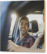 Happy Couple Driving In Car On Road Trip #1 Wood Print