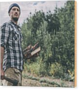 Man Chopping Wood In Rural Landscape #1 Wood Print