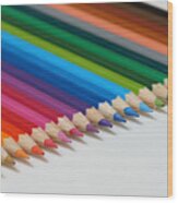 Selective Focus Of Pencil Colours On Near-white Chopping Board #1 Wood Print