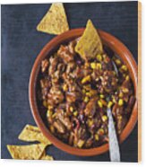 Vegetarian Chili With Soy Meat Cut Into Strips And Tortilla Chips In Earthenware Dish #1 Wood Print
