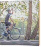 Young Man Cyclist Riding Mountain Bike In Public Park At Moring #1 Wood Print