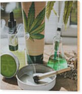 Still-life Selection Of Cbd Products, Conveying Vast Possibilities Of Cannabis As An Ingredient In An Alternative Therapies, Lifestyle And Treatments. #3 Wood Print