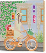 A Girl On A Bicycle Wood Print