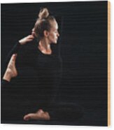 A Woman Is Practicing Yoga Wood Print