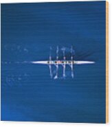 Aerial View Of A Rowing Boat Surrounded By Classic Blue Water Wood Print