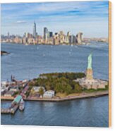 Aerial View Of The Statue Liberty Island In Front Of Manhattan Skyline. New York. Usa Wood Print