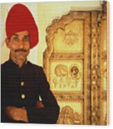 An Indian Guardsman Standing In Front Of A Golden Door, India, Jaipur, City Palace, Half Port Wood Print