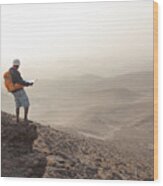 Aspirations For Adventure. Reading Map And Looking On Horizon Over Desert Landscape. Wood Print