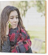 Attractive Girl With Scarf Talking On Mobile, Outdoor. Wood Print